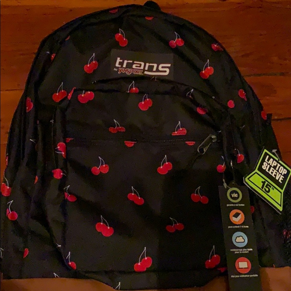 Black w/red cherries tan bottom JanSport backpack